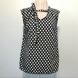 Sleeveless dress top with tie detail